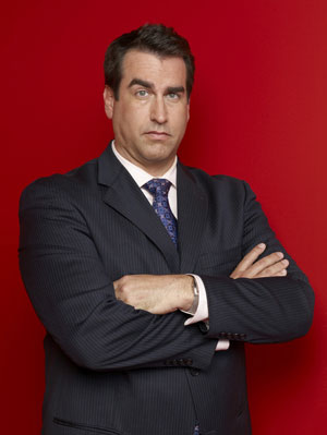 DAILY SHOW vet Rob Riggle left for the West Coast but is back for four shows at Comix