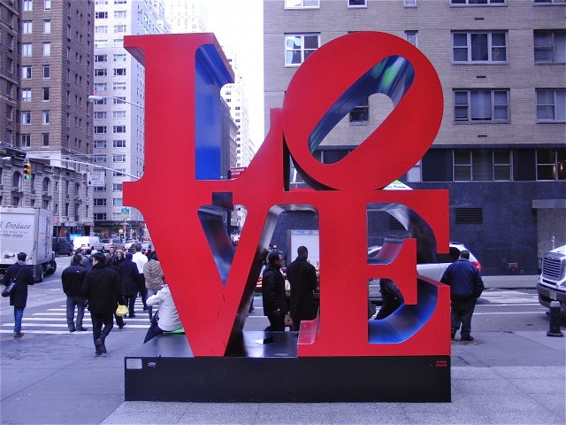 Robert Indiana’s “Love” sculpture attracts attention on Sixth Ave. in Midtown (photo by twi-ny/mdr)
