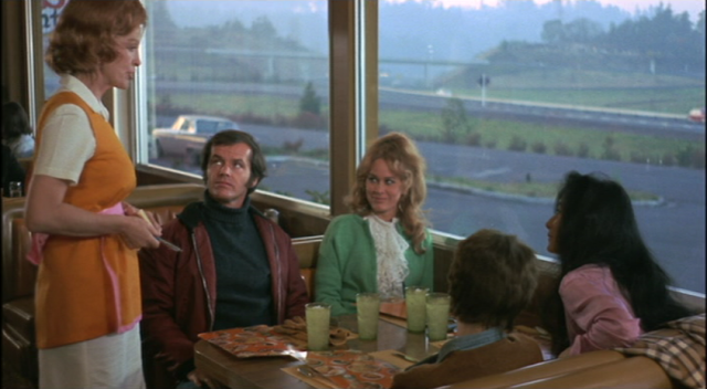 Jack Nicholson, sitting next to Karen Black, is about to place the most famous sandwich order in film history