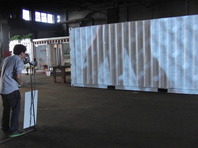 Artist Garson Yu shows how it’s done at his new multimedia public art installation (photo by twi-ny/mdr)