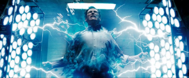 Jon Osterman (Billy Crudup) turns into Dr. Manhattan in WATCHMEN