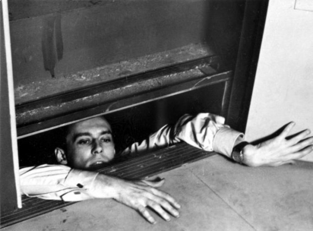 Julien Tavernier (Maurice Ronet) finds himself in a tight squeeze in French Nouvelle Vague noir classic