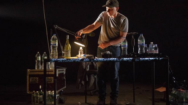 Simon McBurney makes remarkable use of unusual props in THE ENCOUNTER (photo by Joan Marcus)