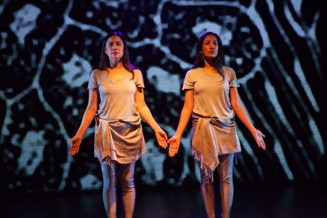Purva Bedi and Mariana Newhard perform a duet in ASSEMBLED IDENTITY (photo by Benjamin Heller)