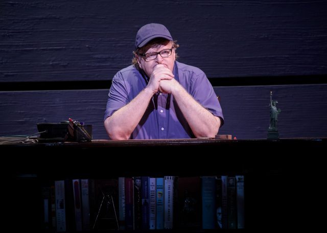 Michael Moore settles in for his Broadway debut, The Terms of My Surrender (photo by Joan Marcus)
