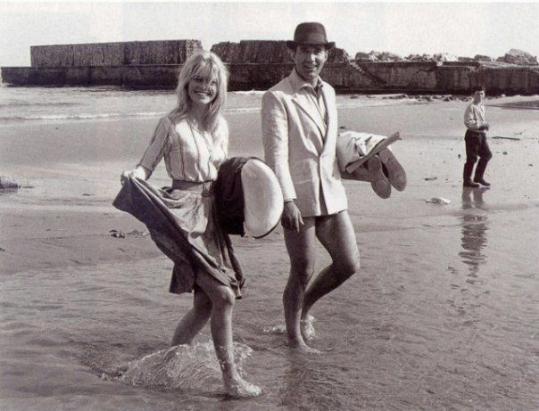 Brigitte Bardot and Michel Piccoli take a break from filming Jean-Luc Godards Contempt