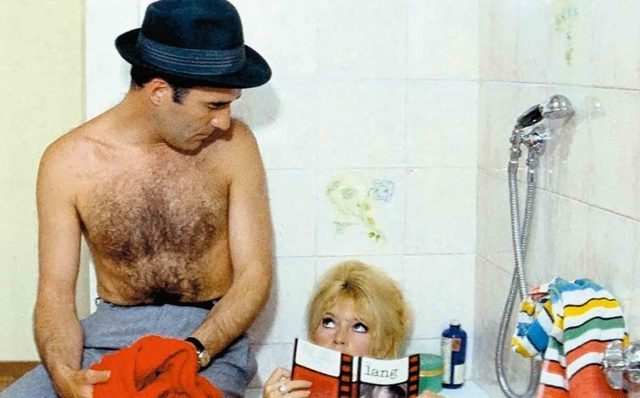 A barechested Michel Piccoli gets a bit of contempt from Brigitte Bardot in Jean-Luc Godard film