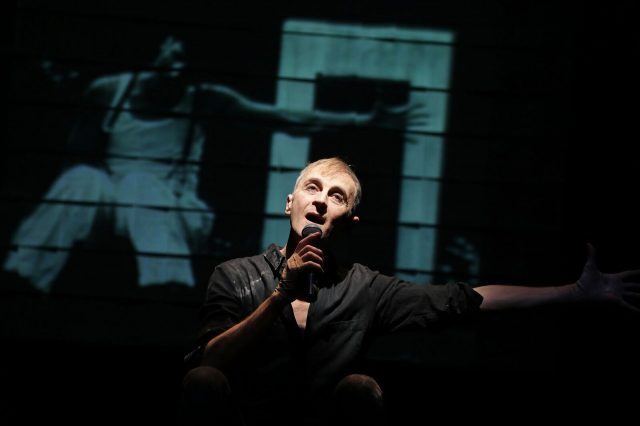 John Kelly looks back at his life and art in autobiographical one-man show (photo by Theo Cote)